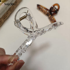Nalodu side profile with clip open, strong spring and wide jaw benefit