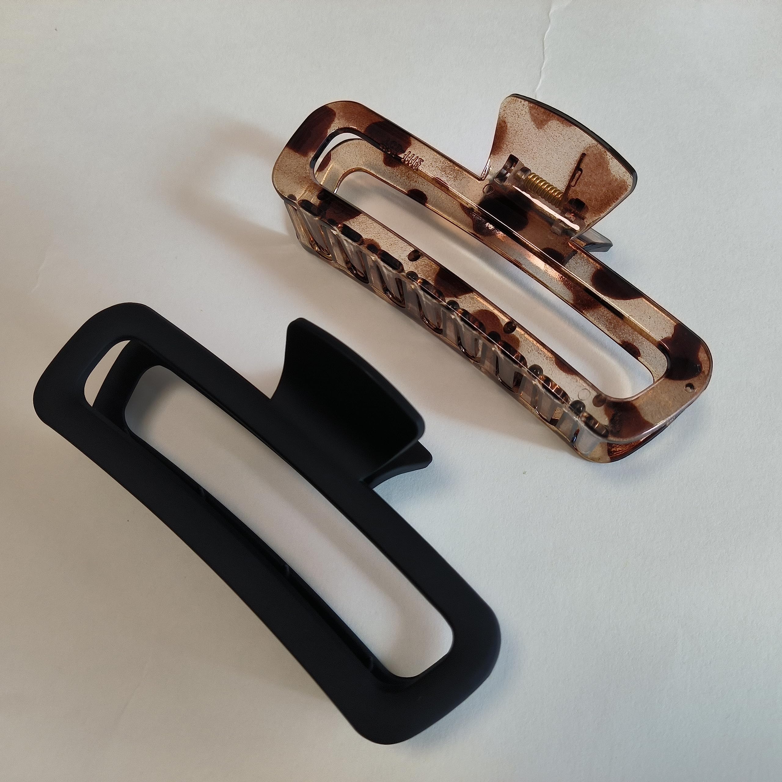 Nalodu clip next to a ruler showing 5-inch scale and capacity benefit