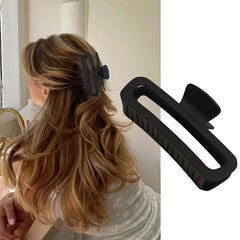 Nalodu clip inside a purse showing travel-ready, compact storage benefit