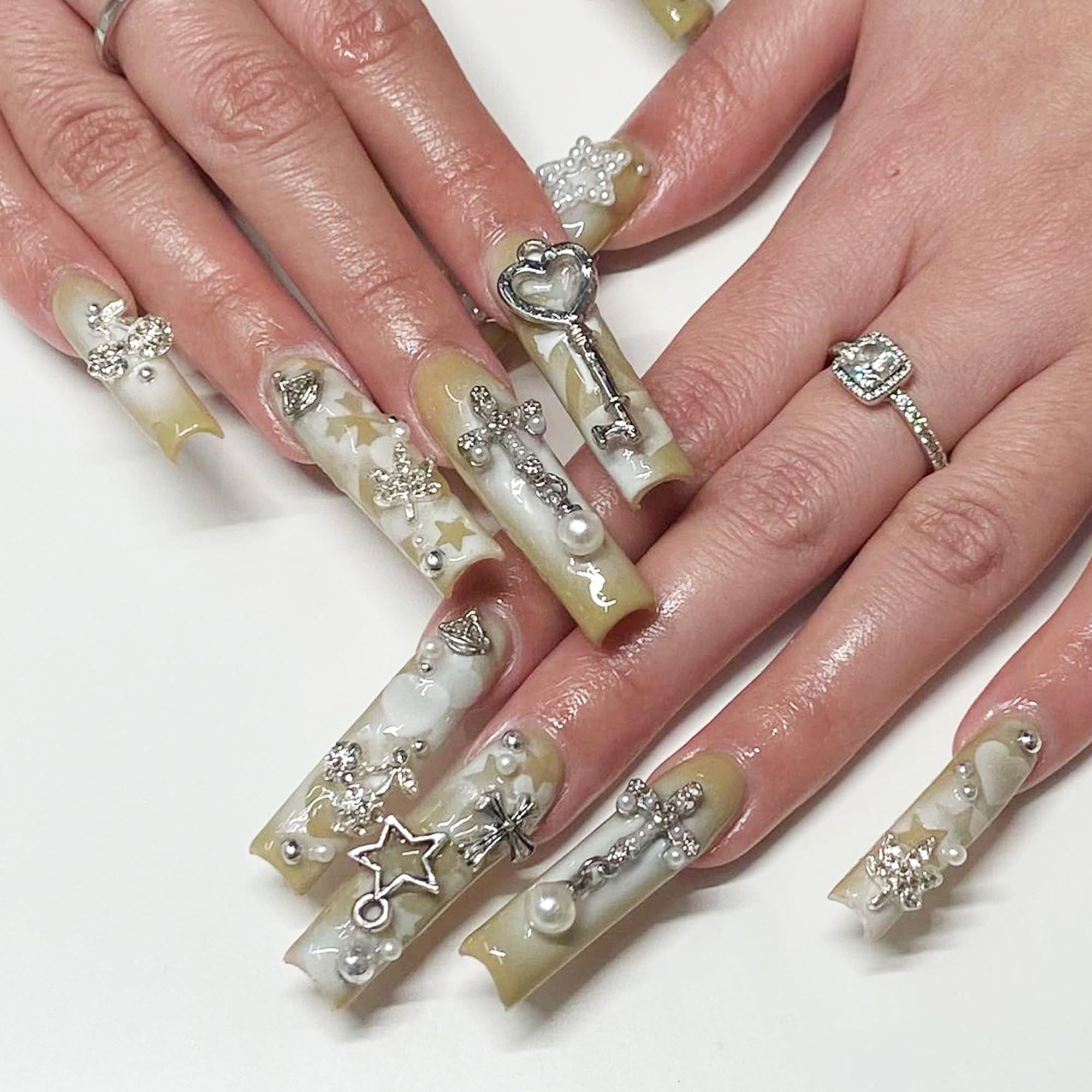 Namifin charms on acrylic nail in use offering stylish nail accent