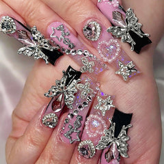 Namifin cross charm applied on gel nail illustrating secure adhesion