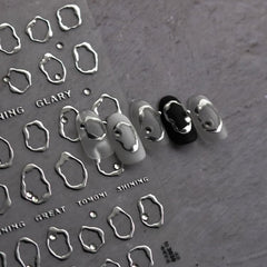 Namrec sticker applied on gel nail demonstrating reflective silver gold accent benefit