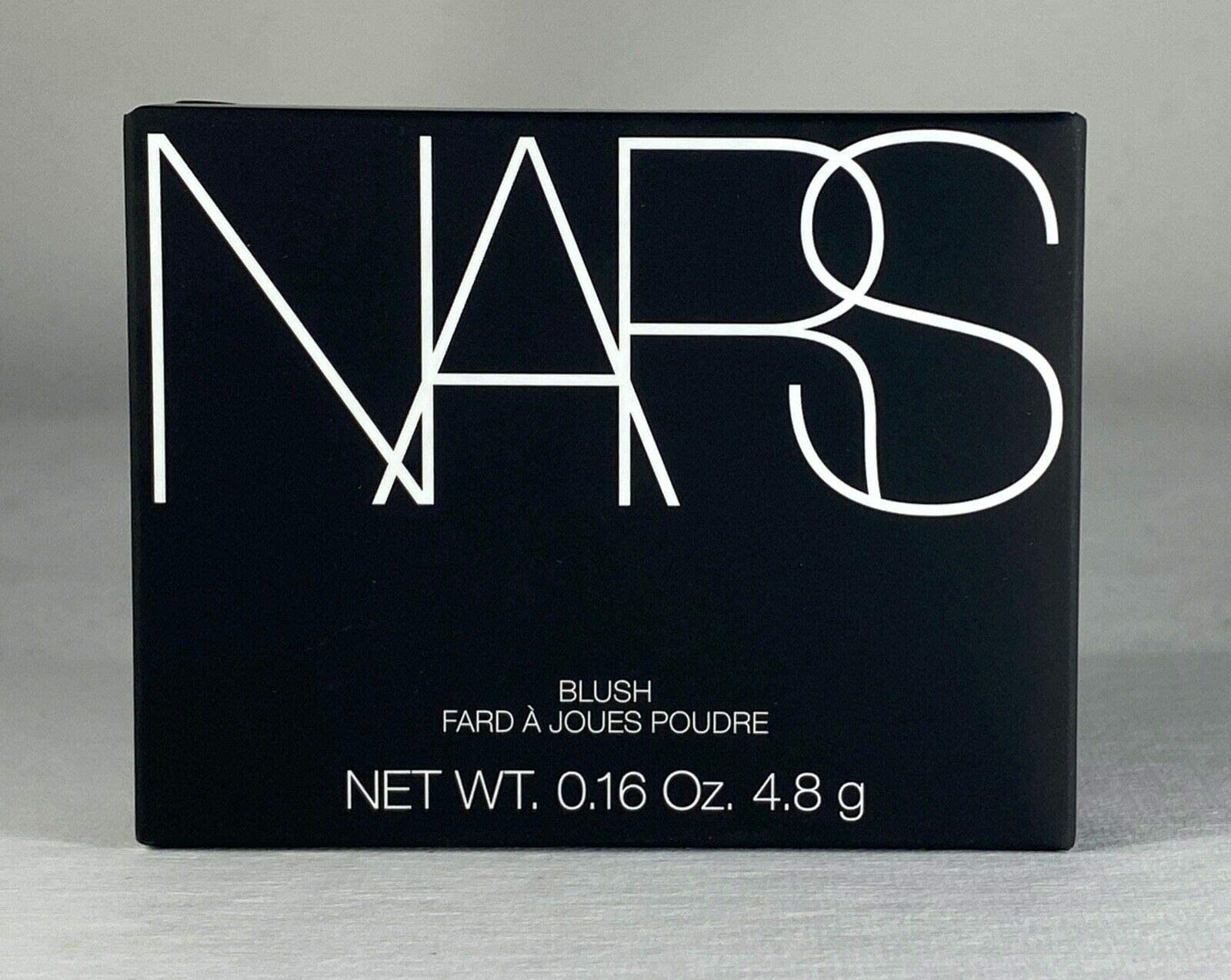 NARS Orgasm blush applied on medium skin for natural warm glow