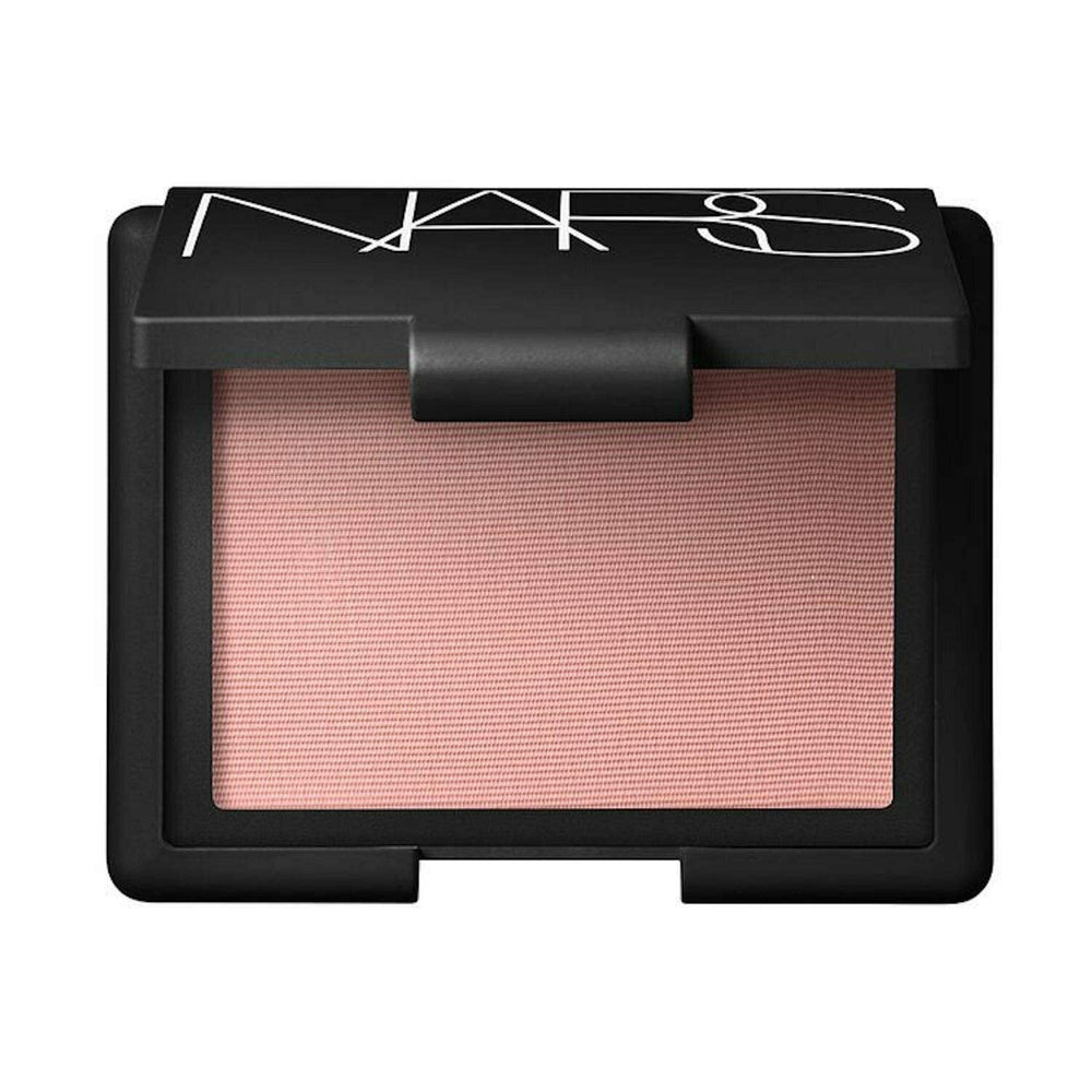 NARS Orgasm blush texture close-up revealing fine golden shimmer