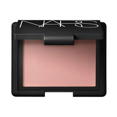 NARS Orgasm blush texture close-up revealing fine golden shimmer