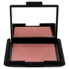 NARS Orgasm powder close-up texture highlighting blendable, fine-milled finish