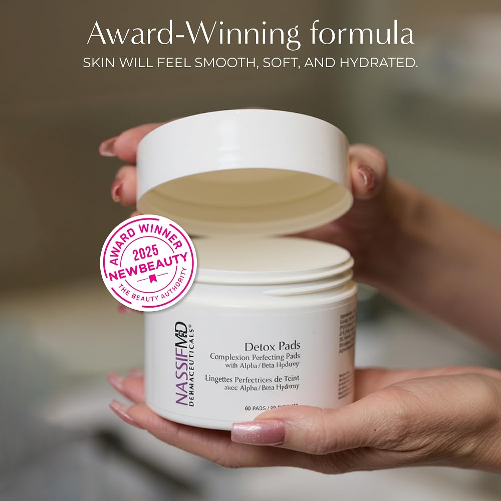 NASSIFMD pads staged with skincare bottles for regimen compatibility