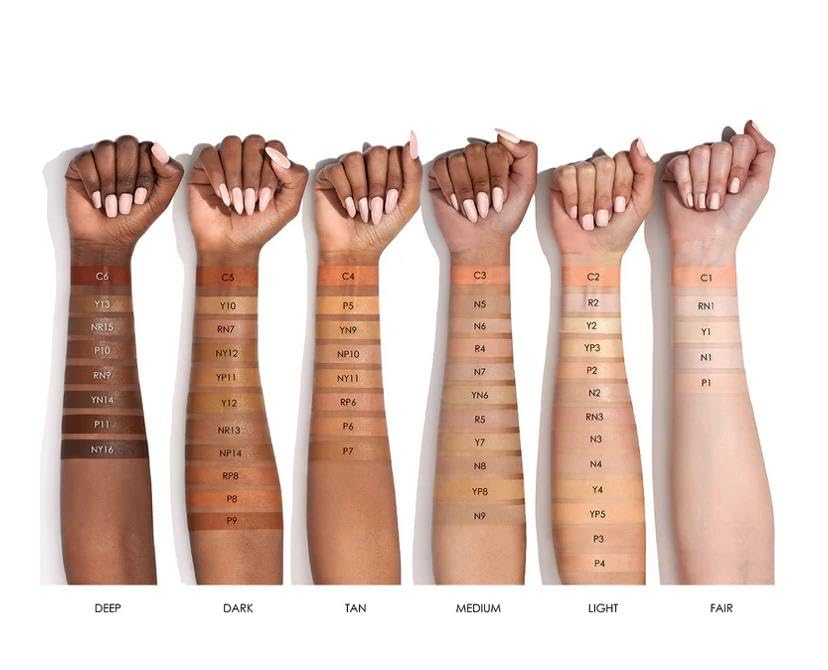 Natasha Denona concealer in use under eye demonstrating coverage benefit: natural brightening