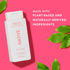 Native bottle beside fresh grapefruit and bergamot, scent inspiration and freshness