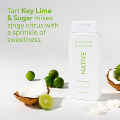 Native key lime and sugar botanicals beside bottle illustrating plant-derived ingredients and freshness