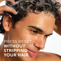 Native shampoo lathering in hand to show gentle, foaming cleanse without sulfates