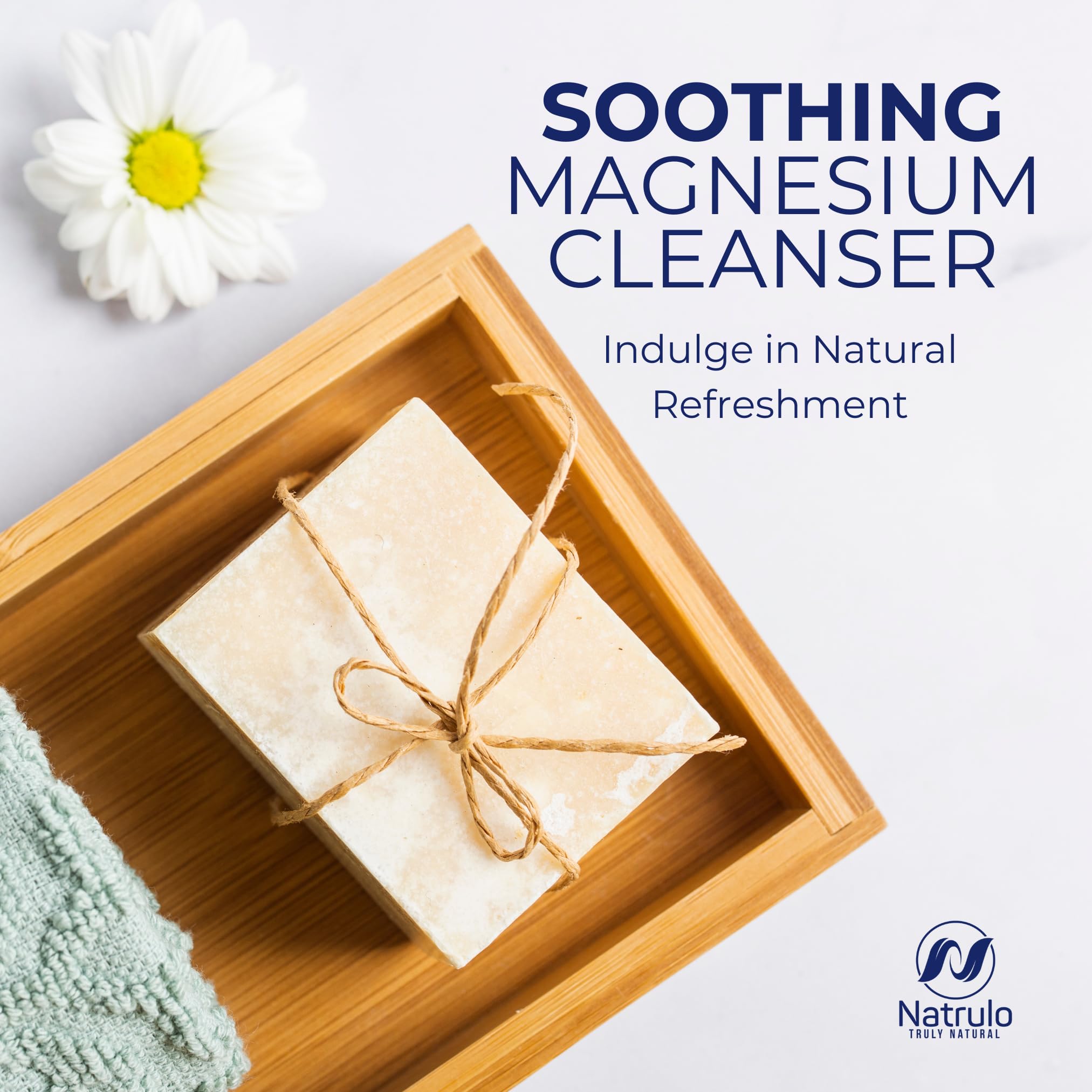 Natrulo soap beside lavender and chamomile botanicals suggesting calming aroma