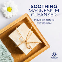 Natrulo soap beside lavender and chamomile botanicals suggesting calming aroma