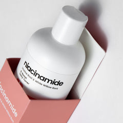 natural outcome bottle in bathroom setting suggesting daily routine compatibility