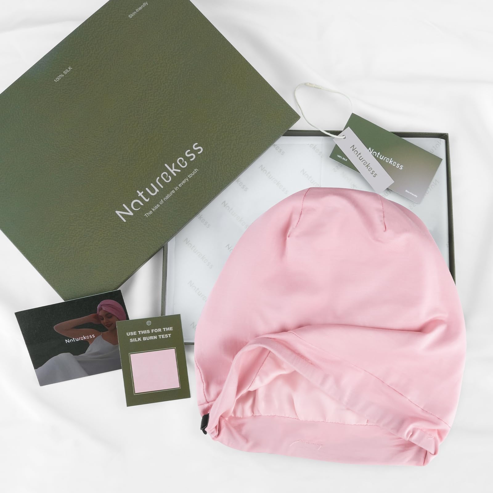 NatureKess pink bonnet styled in lounge setting benefit: fashionable at home