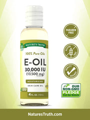 Nature's Truth dropper releasing oil demonstrating controlled application