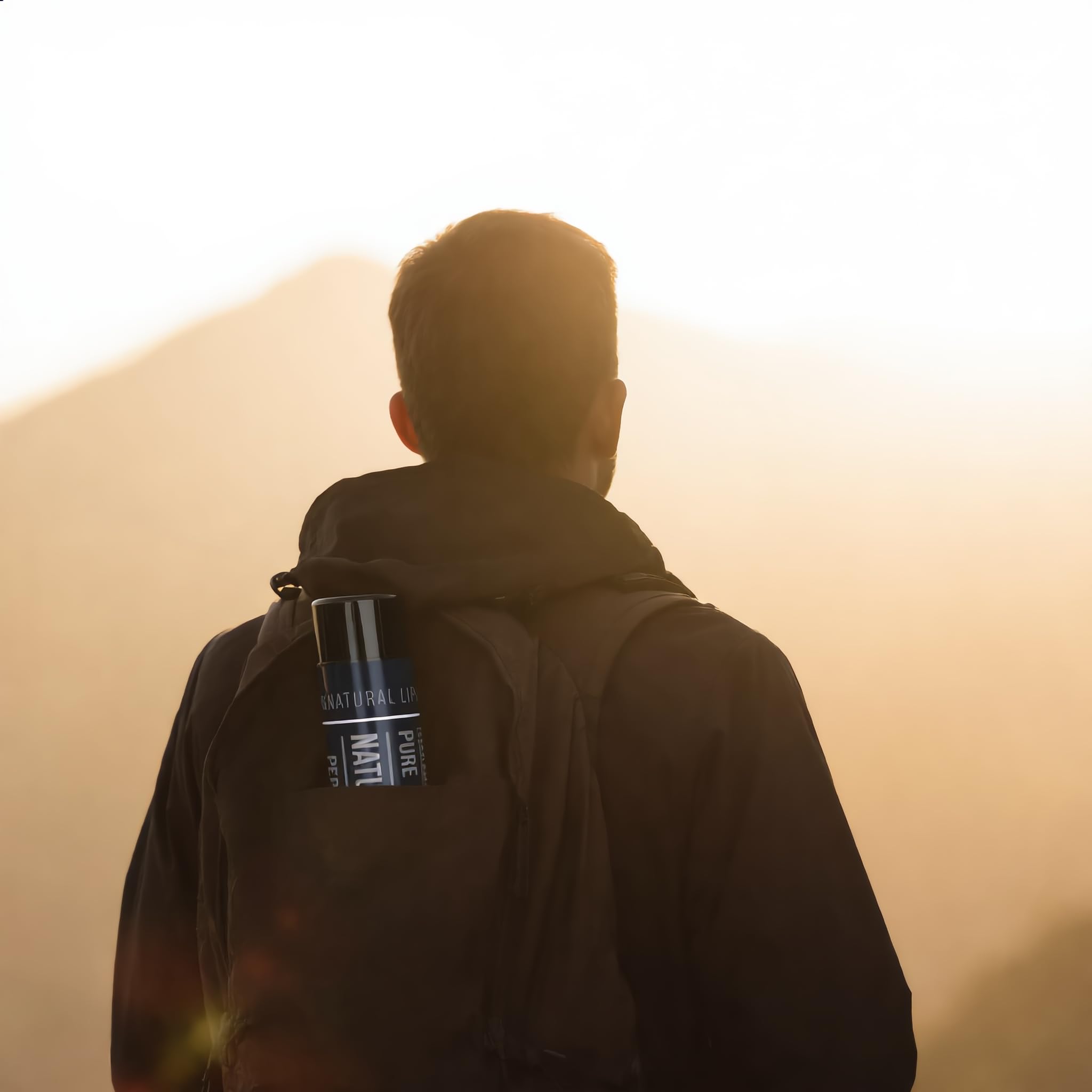 Naturistick tube held in hand to show travel size portability and everyday convenience