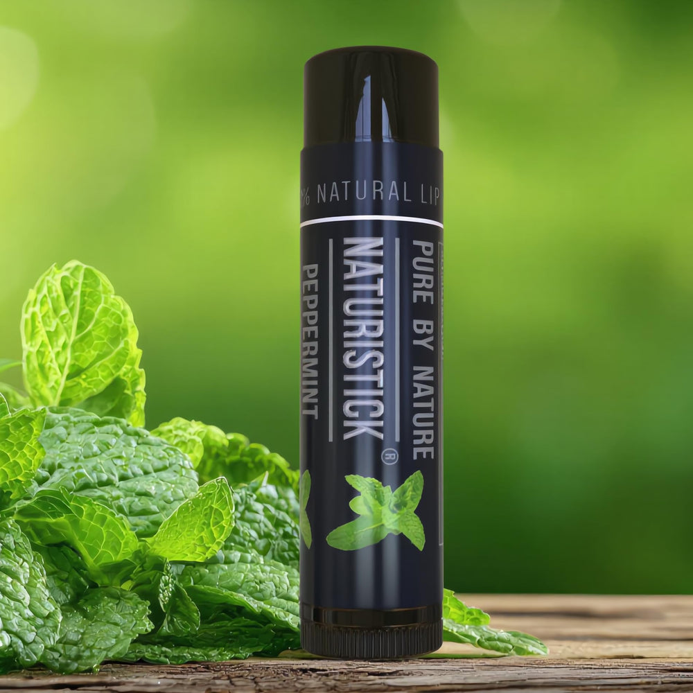 Naturistick single tube open on lips application, demonstrating smooth glide and non-sticky finish