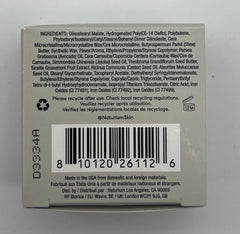 Lifestyle scene: Naturium Phyto-Glow in a handbag emphasizing on-the-go lip repair and nourishment