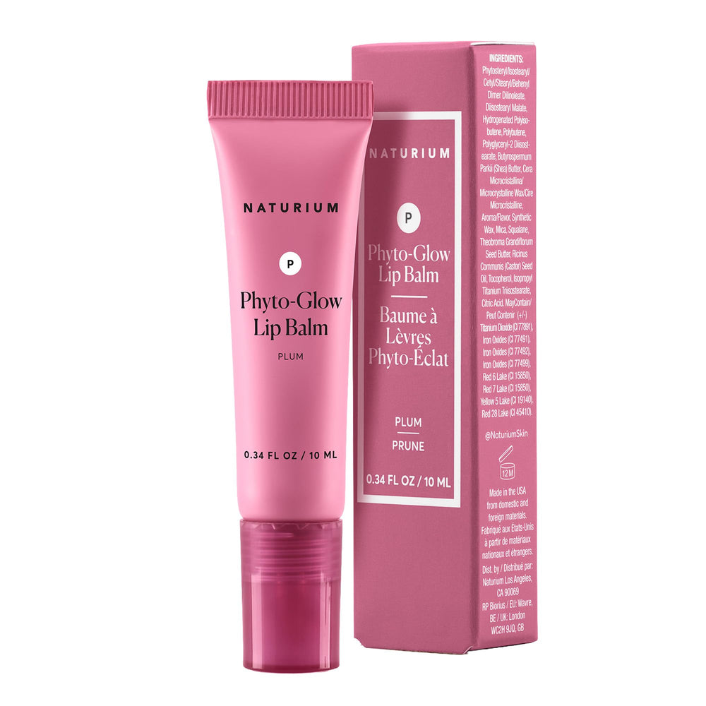 Naturium balm held in hand showing compact size and travel-friendly hydration