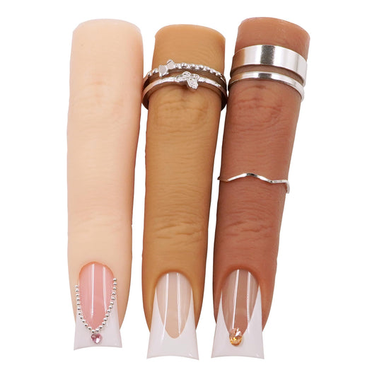 Naughtology front view of three silicone practice fingers showing natural tones and setup benefit