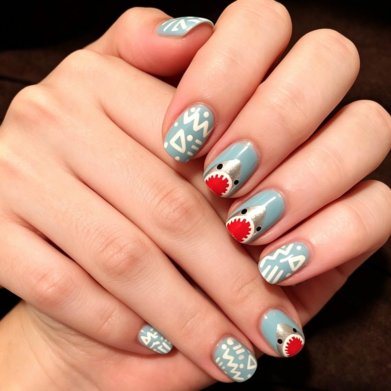 NBNTGH front packaging showing 24 blue short square press-on nails, clear contents