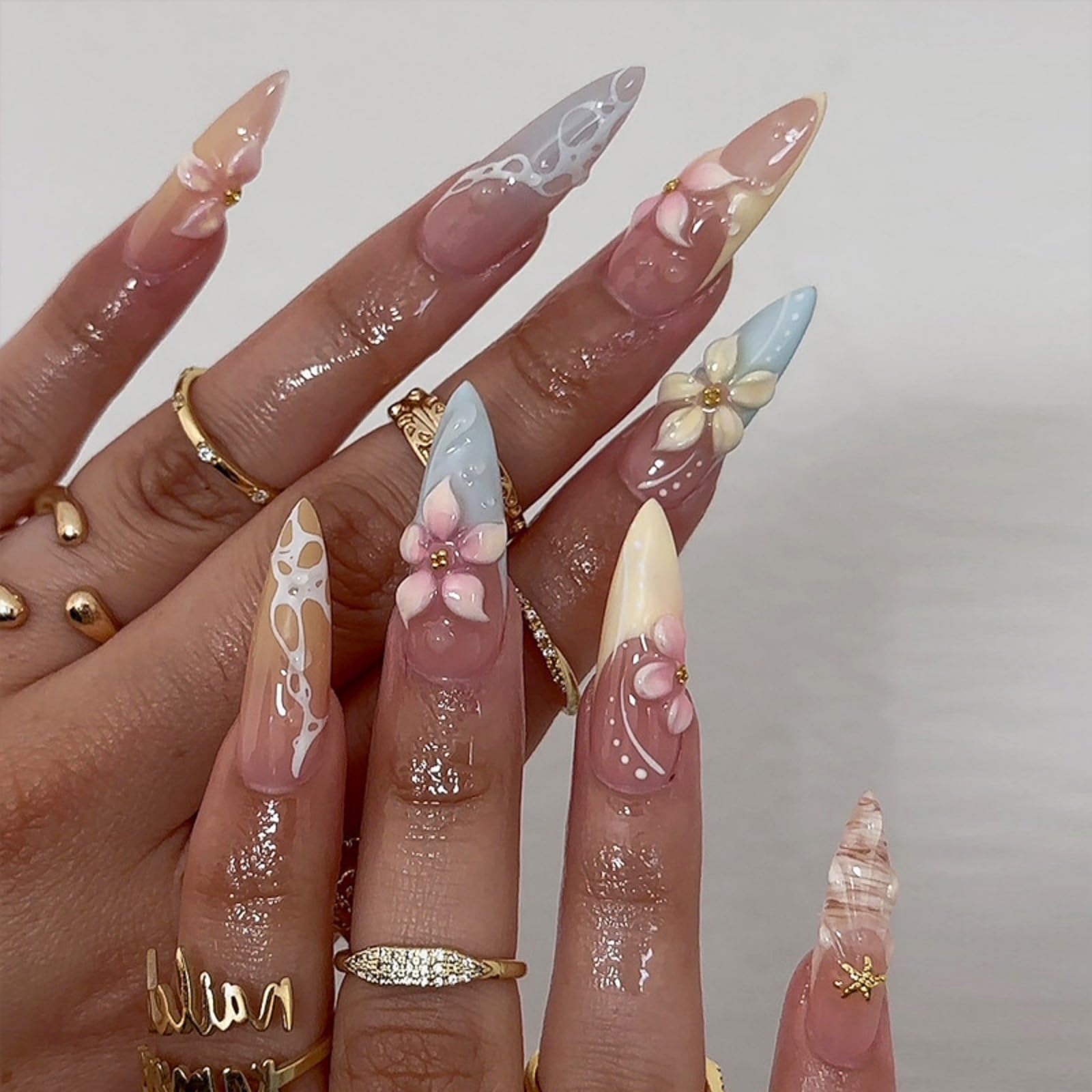 NBNTGH front packaging showing blue yellow floral press on nails benefit easy selection