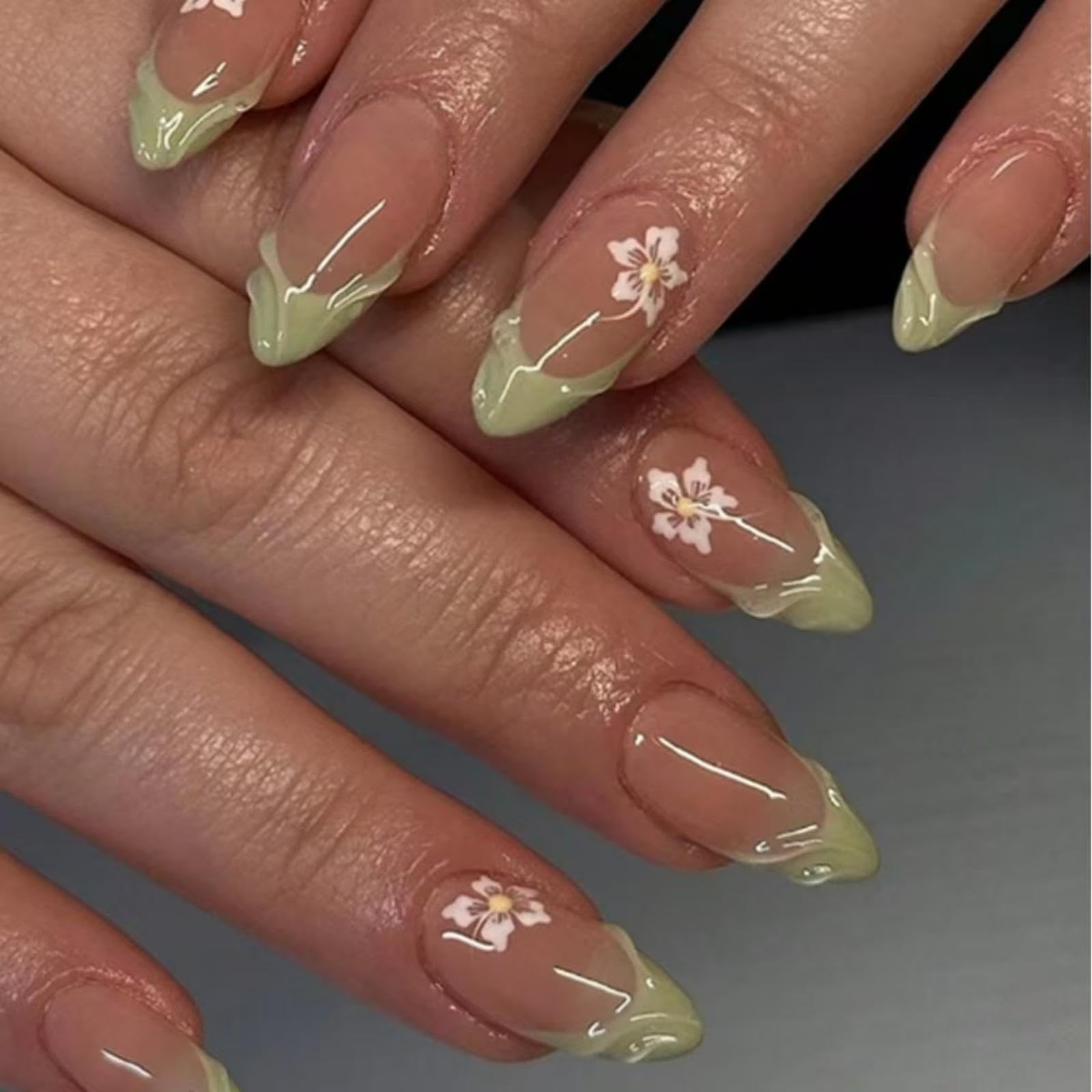 NBNTGH front packaging showing 24-piece floral press-on nails and accessories for convenience