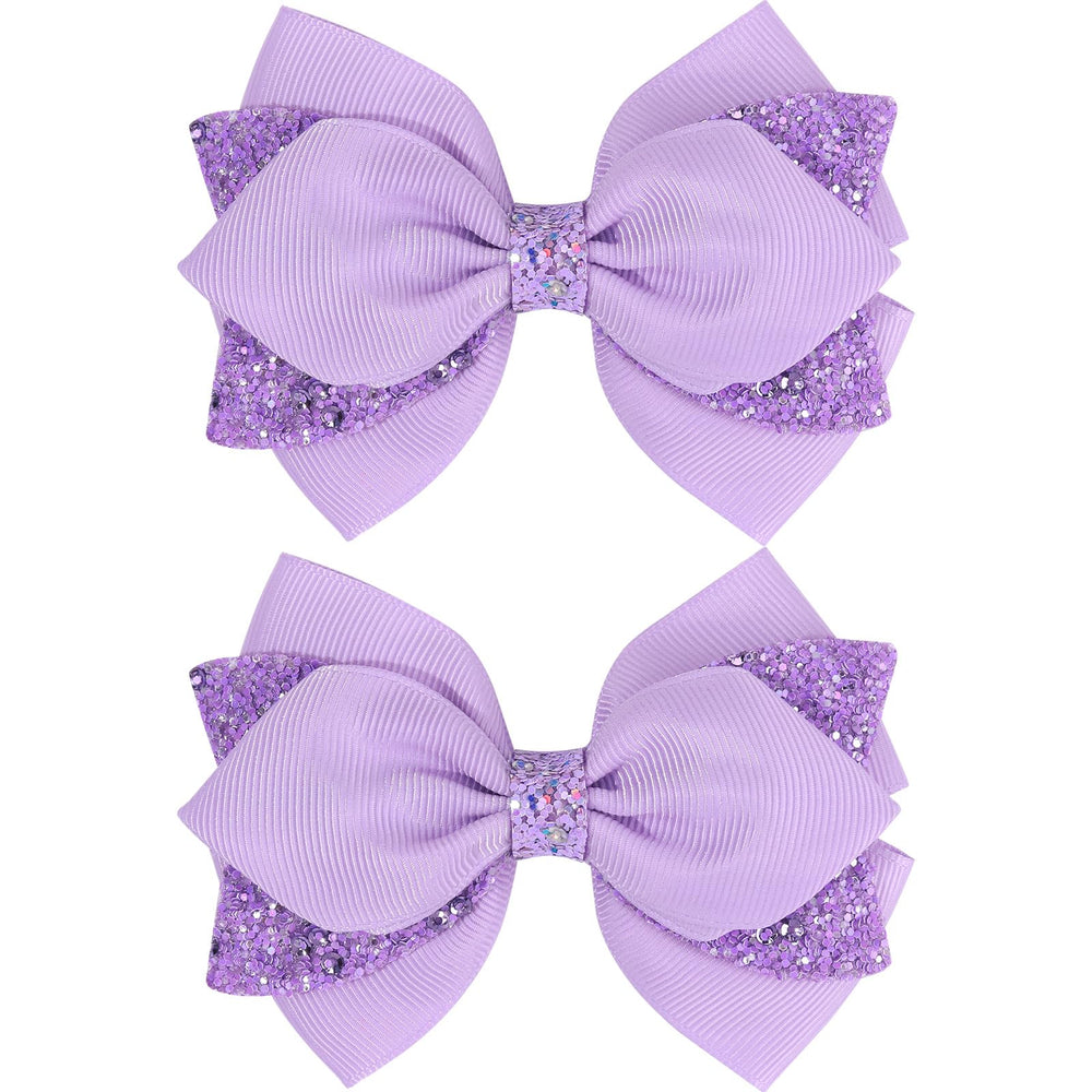 NCMAMA front view of purple sequin bow showing boutique style and shine