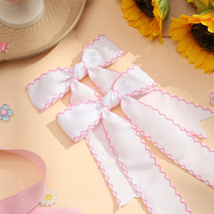 NCMAMA boxed pack of two bows ready for gifting or storing