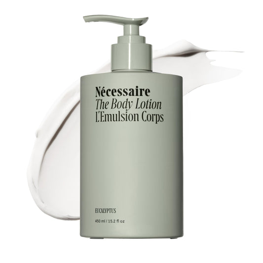 Nécessaire front bottle showing clean label and ergonomic pump for easy application
