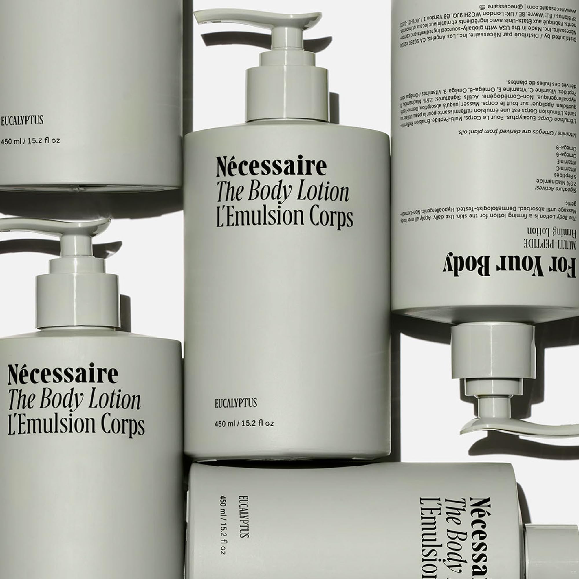 Nécessaire bottle pump and label detail highlighting ingredient transparency and use