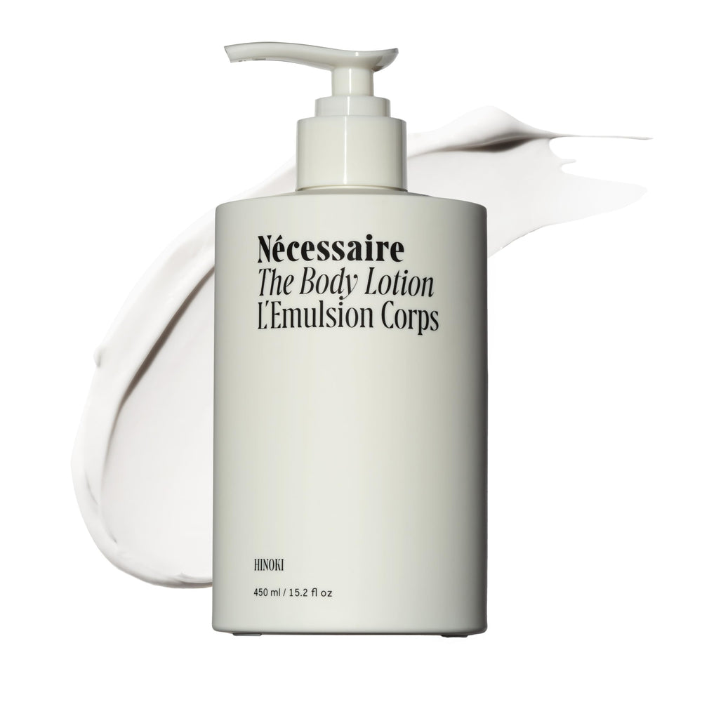Nécessaire front bottle shot showing sleek label and hinoki scent benefit