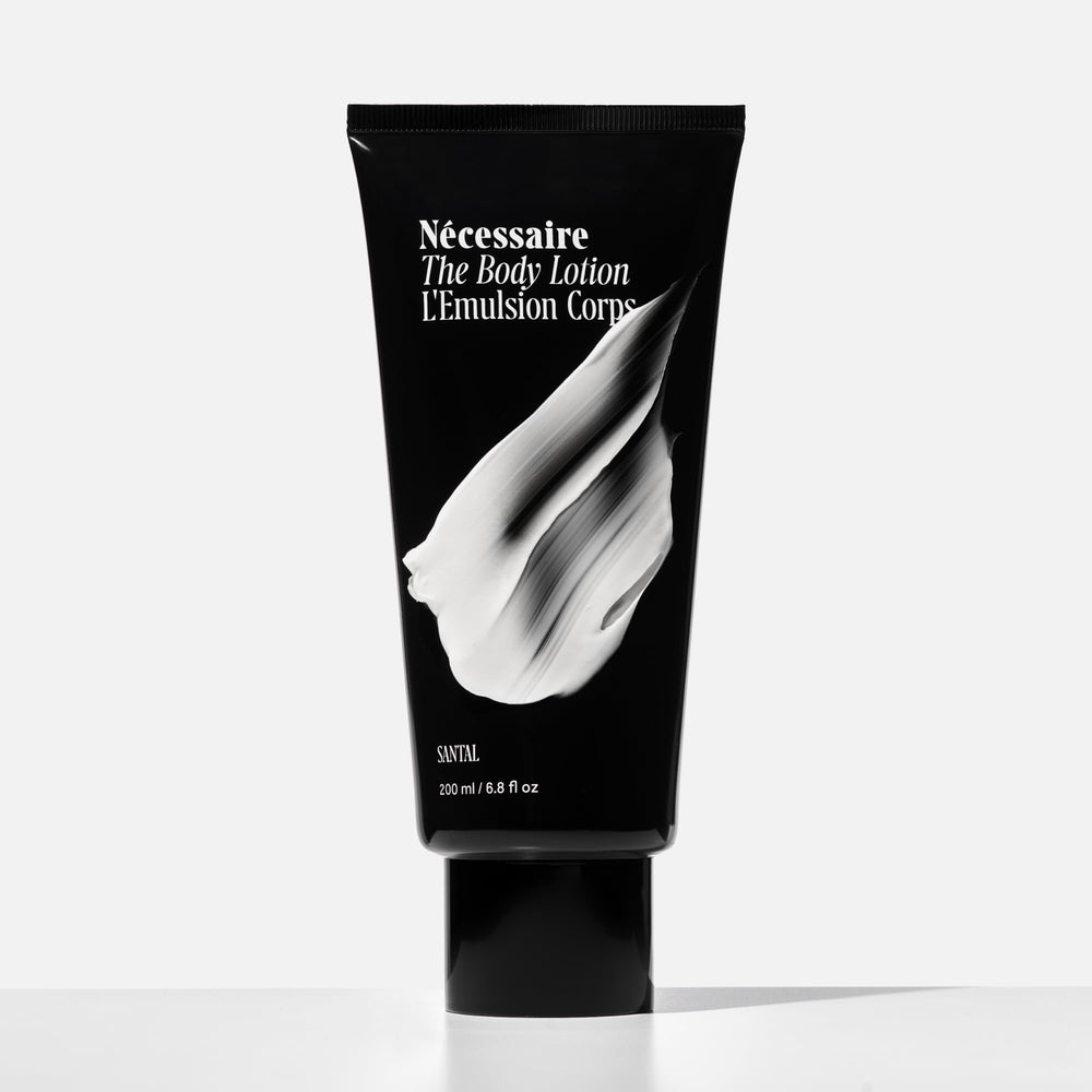 Nécessaire creamy lotion texture close-up demonstrating fast-absorbing, non-greasy finish