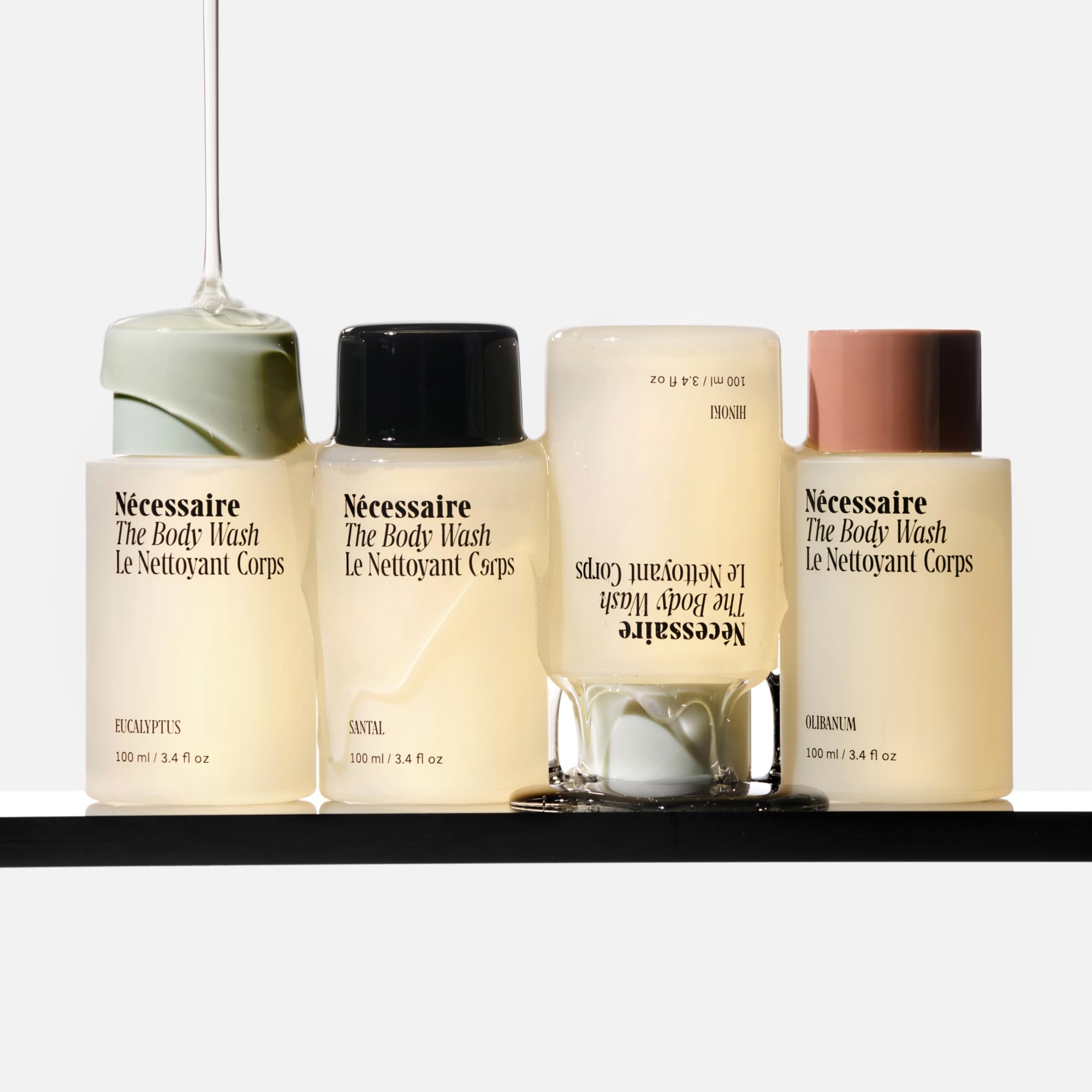 Nécessaire bottle close-up label highlighting gentle formulation benefits