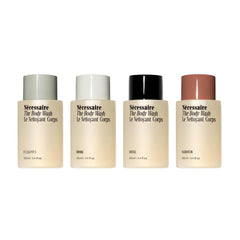Nécessaire front packaging showing the four travel bottles and benefits