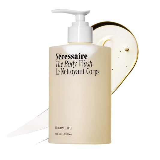 Nécessaire bottle front view showing clean design and benefit of gentle cleansing