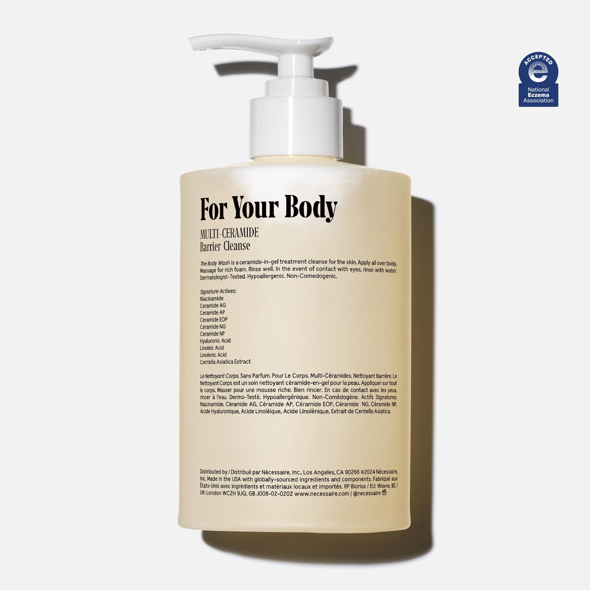 Close-up of Nécessaire label and pump highlighting dermatologist-tested formula