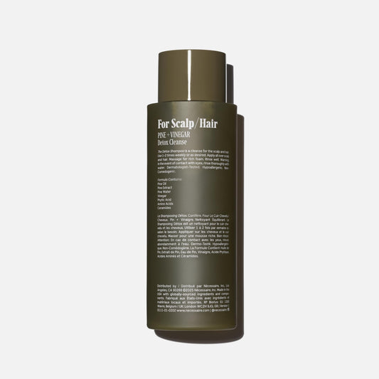 Nécessaire pump and label close-up highlighting easy dispense and clarity
