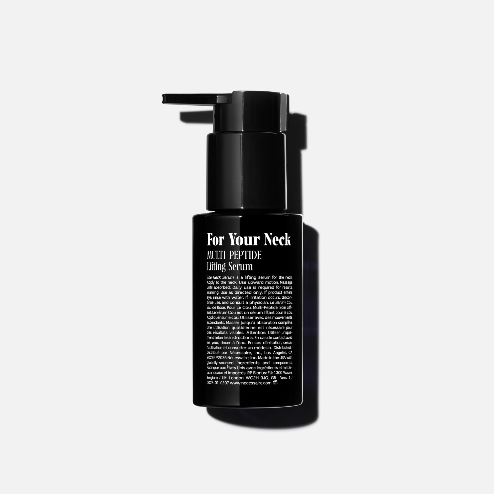Nécessaire pump dispensing serum demonstrating easy, controlled application for neck