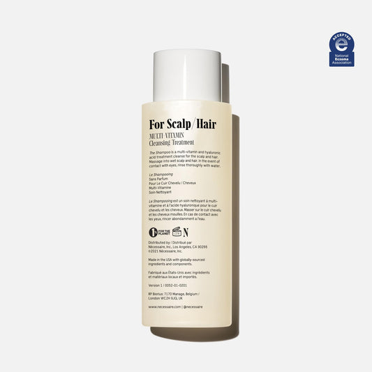 Nécessaire pump dispensing shampoo highlighting controlled application benefit