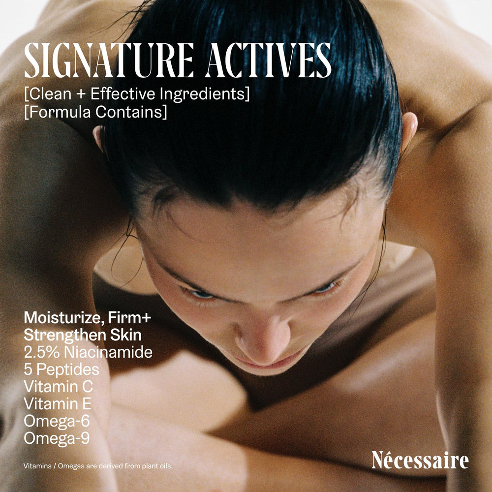 Nécessaire bottle in hand to show 15.2oz size and practical daily use