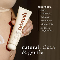 Nemah 3.4 oz bottle next to a ruler to show compact travel-friendly size