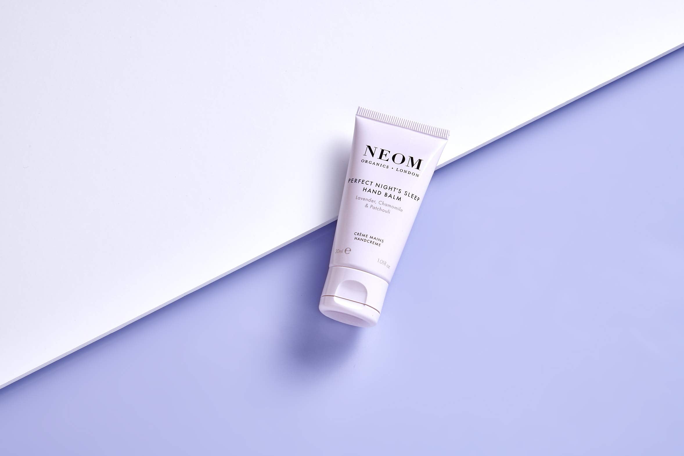 Neom hand balm packaged as luxury gift ideal for presenting