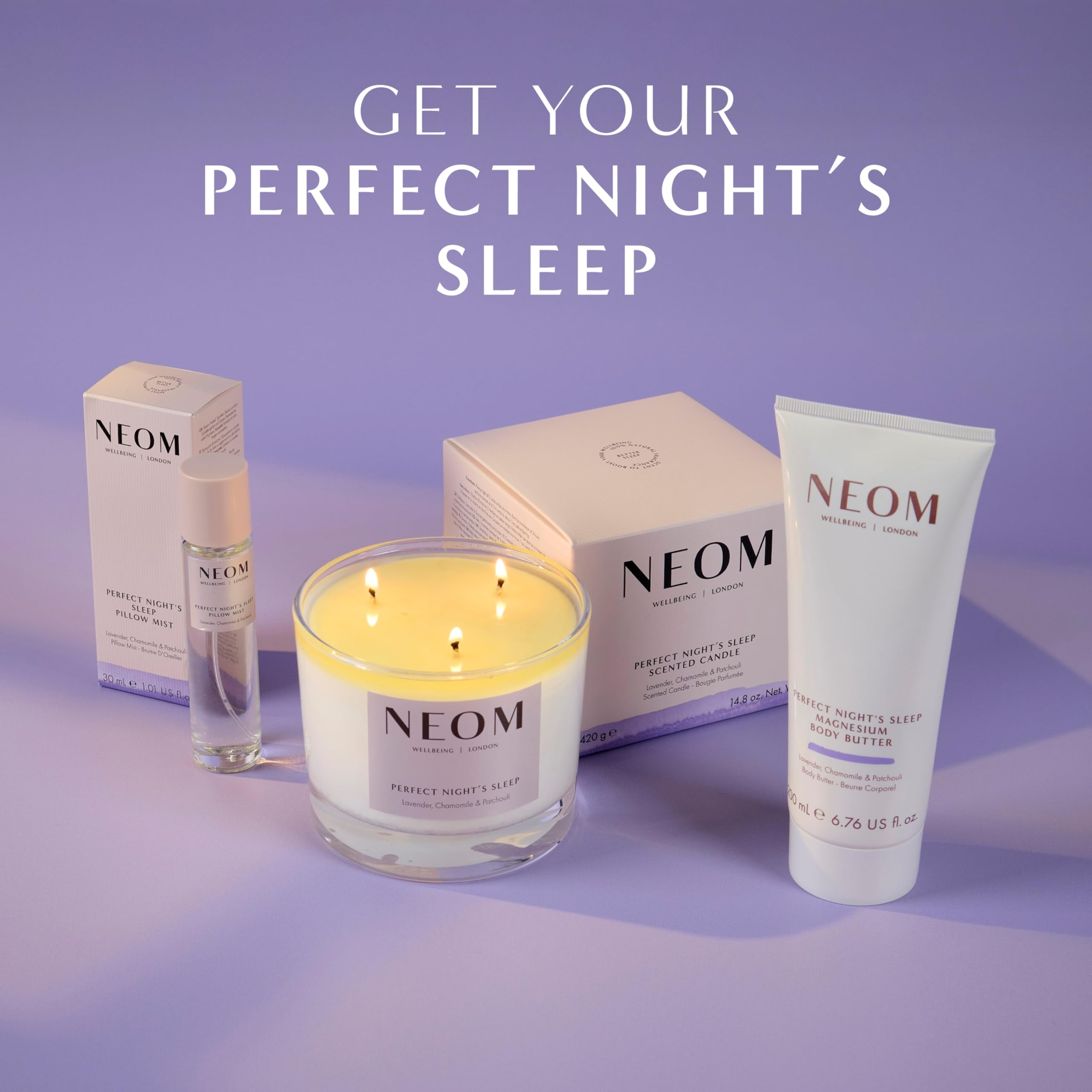 Neom jar on nightstand beside candle suggesting a calming bedtime routine