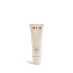 Neom travel-size tube front view showing lavender basil jasmine branding and portability