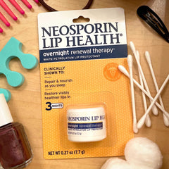 Neosporin in a travel pouch demonstrating portability and on-the-go use