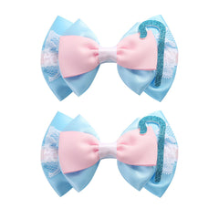 Neujiwo front view of two cartoon bow clips showing colors and glitter benefit styling