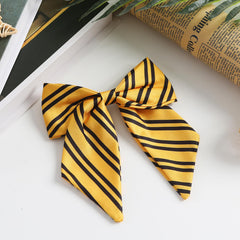 Neujiwo bow worn in a ponytail demonstrates quick styling and visual pop