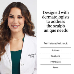 Neutrogena cleanser applied on scalp in shower for targeted clarifying benefit